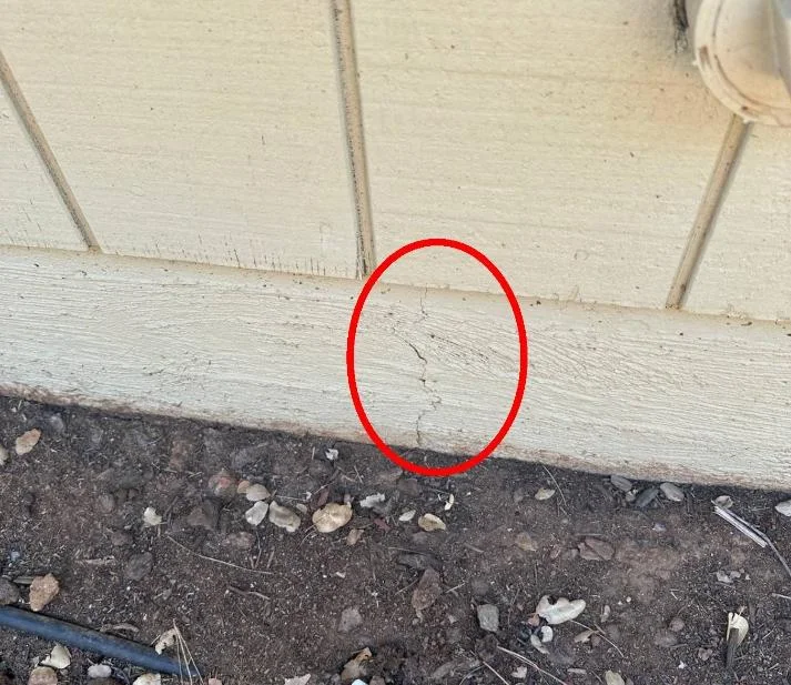 Marked crack at the concrete foundation perimeter near the affected bedroom